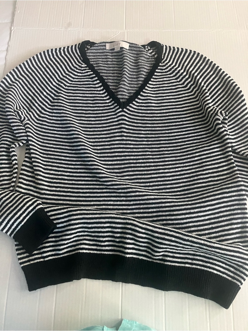 Woman’s  Black and White Striped V-Neck Sweater LOFT.